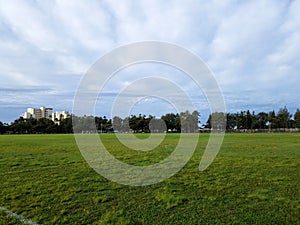 Soccer Field in Kapiolani Park with clouds in the sky