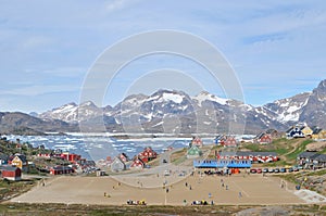 Soccer field in Tasilaq with mountain background photo
