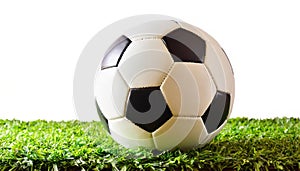 soccer or football ball on astroturf astro turf grass isolated on white background black and white pentagon shape leather pieces