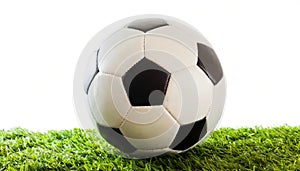 soccer or football ball on astroturf astro turf grass isolated on white background black and white pentagon shape leather pieces