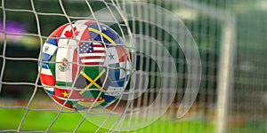Soccer Football ball with flags of North America countries in net on football stadium. North America concacaf championship 2021