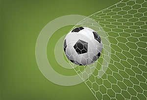 Soccer football ball in goal with white net and green field background. Vector