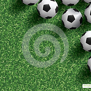 Soccer football ball on green grass field background. Vector.