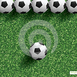 Soccer football ball on green grass field background. Vector.