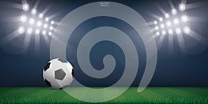 Soccer football ball on green grass of soccer field. Background of soccer stadium with lighting of spotlight. Vector