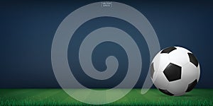 Soccer football ball on green grass of soccer field or football field stadium background. Vector