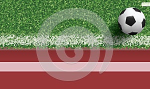 Soccer football ball on green grass of soccer field with running track for sports background. Vector