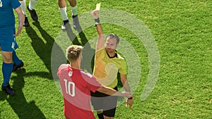 Soccer Football Championship Match: Referee Sees Foul, Gives Signal and Shows Yellow Card, Players