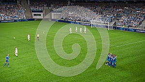 Soccer Football Championship Stadium with Crowd of Fans: Blue Team Attacks, Scores Goal, Players