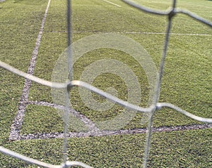 Soccer or football corner lines through safety net