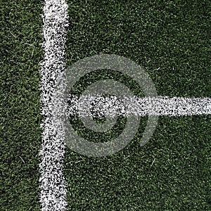 Soccer or football field with white Limit lines