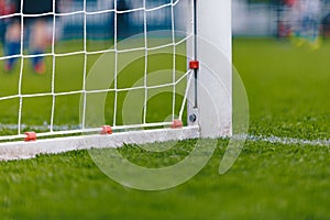 Soccer Football Goal With Net. Football Pitch Field With Fresh Green Grass