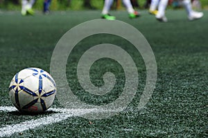 Soccer Football on the Green Grass