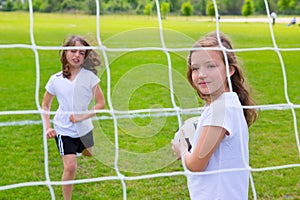Soccer football kid girls playing on field