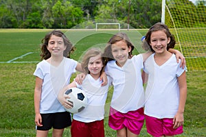 Soccer football kid girls team at sports fileld