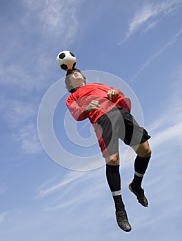 Soccer Football Player making Header