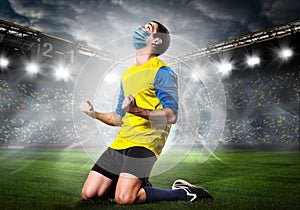 Soccer or football player in mask