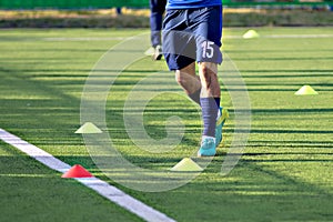 Soccer football players during the team training before the match. Exercises for football soccer youth team. Player