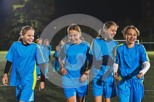 Soccer football teenage girls team at sports outdoor field before match