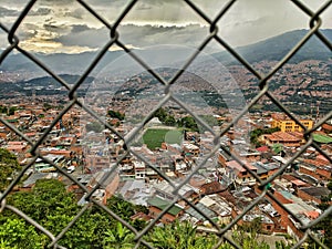 Soccer futbol game through a fence