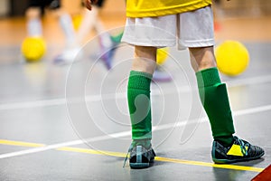 Soccer futsal training for children. Indoor football dribbling training