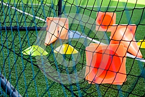 Soccer goal and cones on green artificial turf