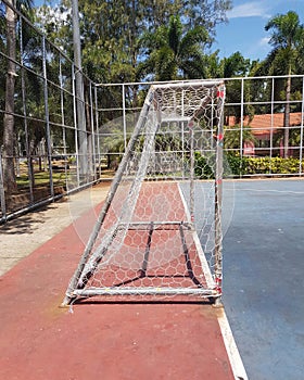 Soccer goal post on concrete floor at court