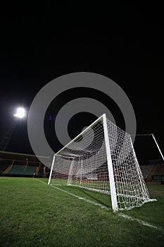 Soccer goal under floodlight