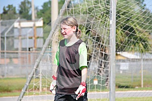 Soccer goalie on field