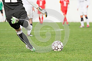 Soccer goalkeeper kick the ball