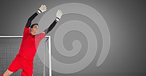 Soccer goalkeeper saving in goal