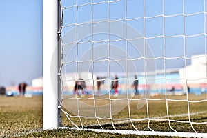 Soccer goalpost and players training