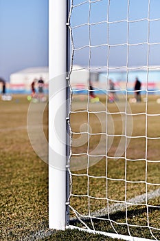 Soccer goalpost and players training