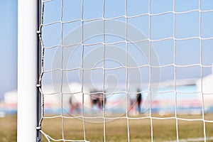 Soccer goalpost and players training