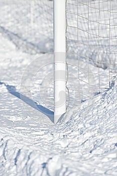 Soccer goalpost and snow