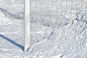 Soccer goalpost and snow