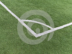 Soccer green field artificial grass with white lines