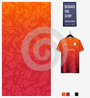 Soccer jersey pattern design. Mosaic pattern on orange background for soccer kit, football kit. Abstract background.