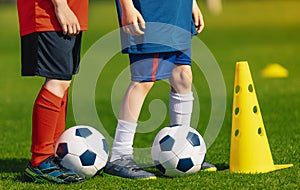 Soccer physical education lesson. Children training football on schools field photo