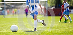 Soccer Player Action On Stadium. Youth Football Tournament Game