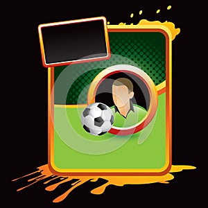 Soccer player and ball on orange splattered banner