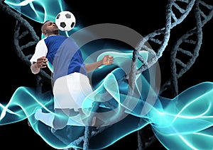 Soccer player with ball and with stone dna chains and black background and blue lights