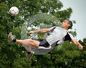 Soccer player in a bicycle kick