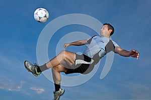 Soccer player in a bicycle kick