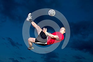 Soccer player in a bicycle kick