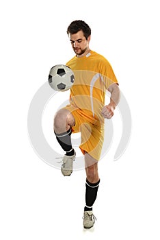 Soccer Player Bouncing Ball on Knee