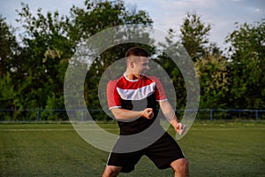 Soccer player celebrating goal on a soccer stadium