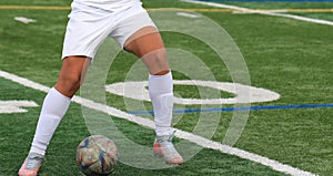 Soccer player controlling the ball during a game