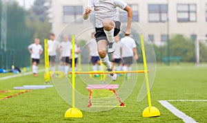 Soccer Player on Fitness Training. Footballers on Practice Session in Field on Sunny Day