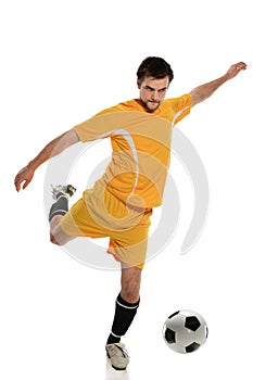 Soccer Player Kicking Ball